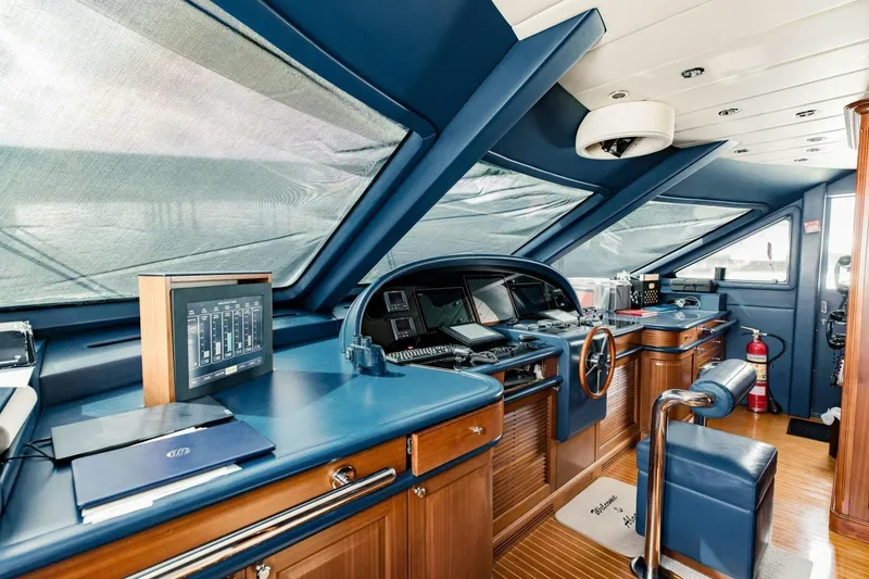 Slide: The Image of Luxurious helm of 2007 Benetti 120 Classic yacht with modern navigation equipment. - 47