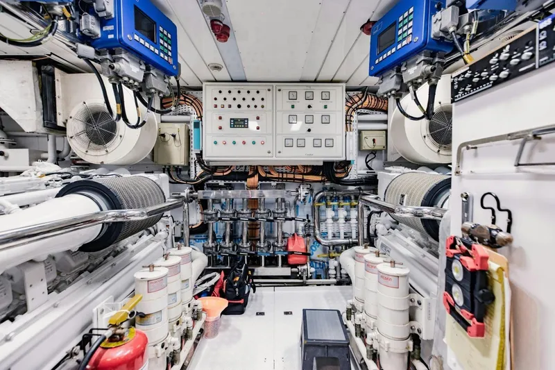 Slide: The Image of Engine room of 2007 Benetti 120 Classic yacht, featuring control panels and machinery. - 51