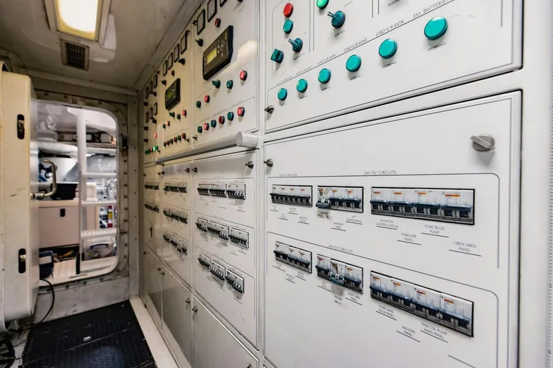 Slide: The Image of Control panel inside 2007 Benetti 120 Classic yacht, featuring switches and indicators. - 52