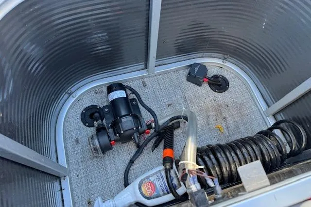 Slide: The Image of 2019 Qwest Edge 280 Cruise boat compartment with pump and wiring. - 18