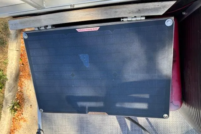 Slide: The Image of 2019 Qwest Edge 280 Cruise solar panel on a boat deck. - 19