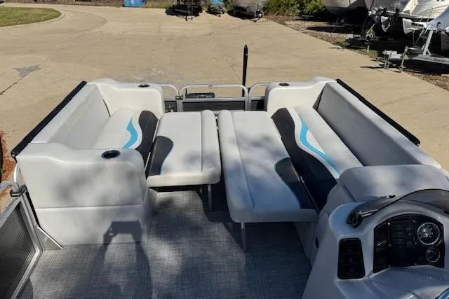 Slide: The Image of 2019 Qwest Edge 280 Cruise boat interior with seating and control panel. - 9
