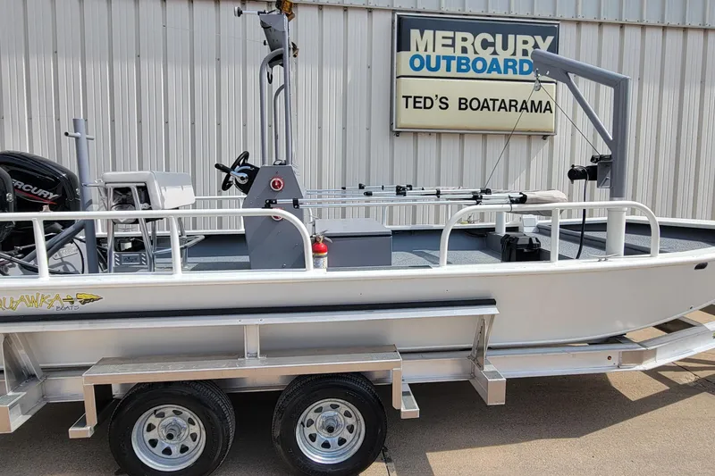 Slide: The Image of 2025 AQUAWKA BOATS 2072 Aluminum on trailer at Ted's Boatarama, Mercury outboard visible. - 15