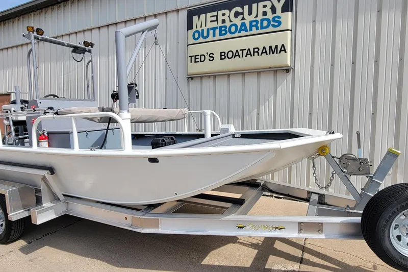 Slide: The Image of 2025 AQUAWKA BOATS 2072 Aluminum on trailer at Ted's Boatarama, Mercury Outboards sign visible. - 2