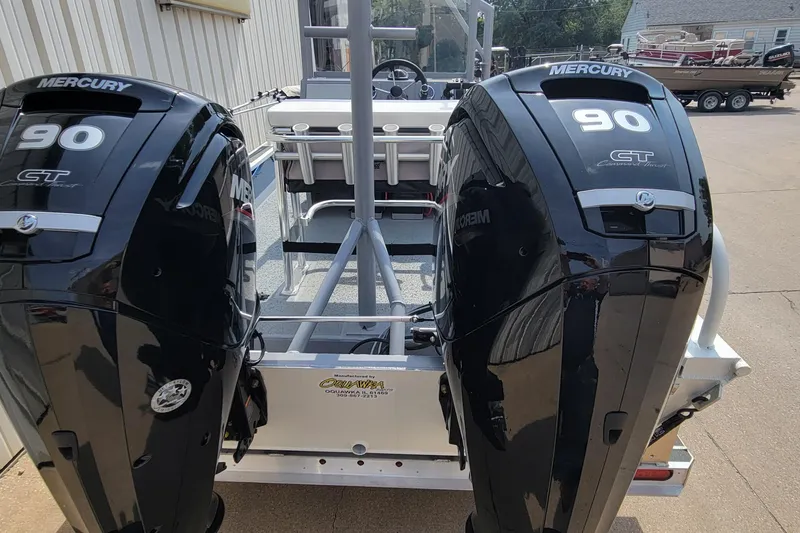 Slide: The Image of 2025 AQUAWKA BOATS 2072 ALUMINUM with dual Mercury 90 engines, parked outdoors. - 3