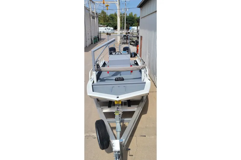 Slide: The Image of 2025 AQUAWKA BOATS 2072 OB Aluminum boat on trailer, outdoor setting. - 9