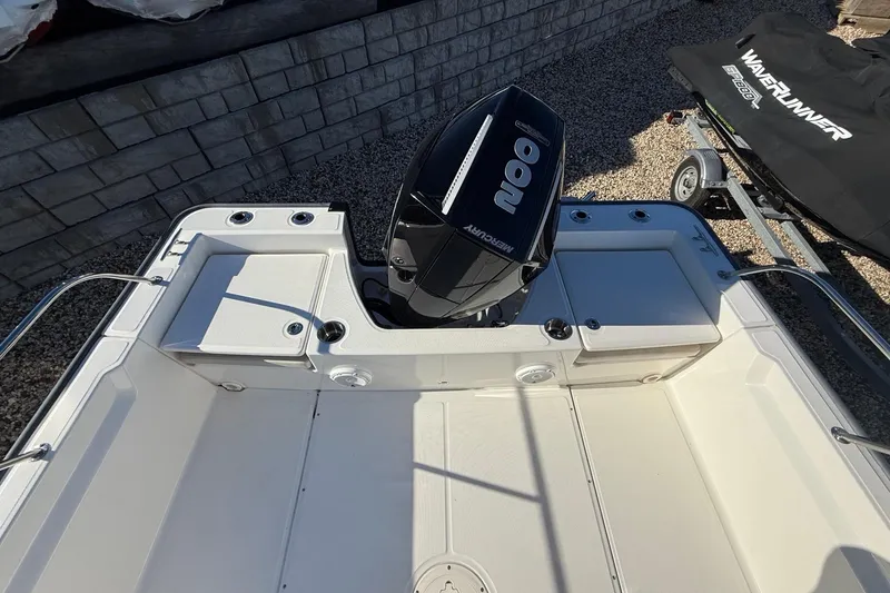 Slide: The Image of 2023 Boston Whaler 210 Montauk boat with Mercury engine, rear view. - 6
