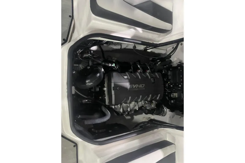 Slide: The Image of 2025 Yamaha AR195 boat engine compartment showcasing SVHO engine components. - 10