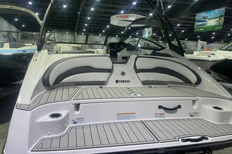 Slide: The Image of 2025 Yamaha AR195 boat interior with sleek seating and modern design. - 4