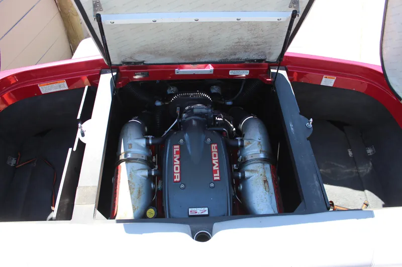 Slide: The Image of 2011 MasterCraft X-15 engine compartment featuring Ilmor engine components. - 16
