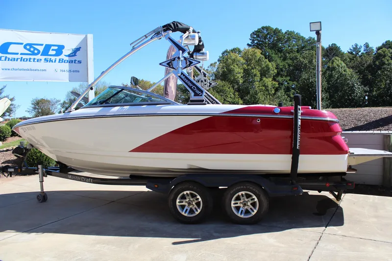 Slide: The Image of 2011 MasterCraft X-15 boat on trailer at Charlotte Ski Boats dealership. - 5