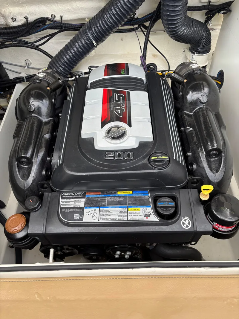 Slide: The Image of 2022 Bayliner VR6 Bowrider I/O engine, featuring a powerful 4.5L 200 HP motor. - 7