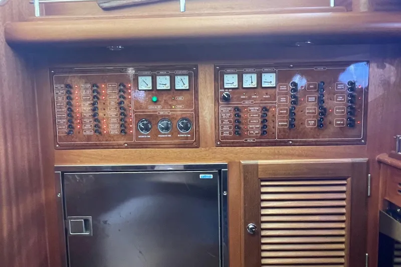 Slide: The Image of Control panel of a 2008 Vicem 52 Classic yacht with wood finish and gauges. - 12