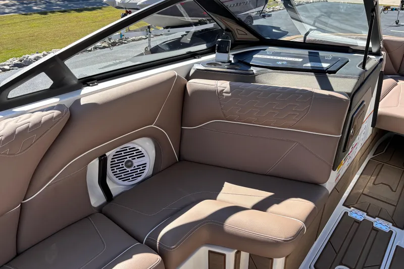 Slide: The Image of 2026 Centurion Ri230 boat dashboard with dual screens and modern controls. - 10