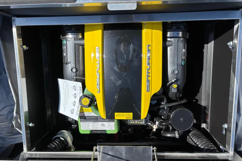Slide: The Image of Rear view of 2026 Centurion Ri230 boat showcasing propeller and exhaust system. - 15