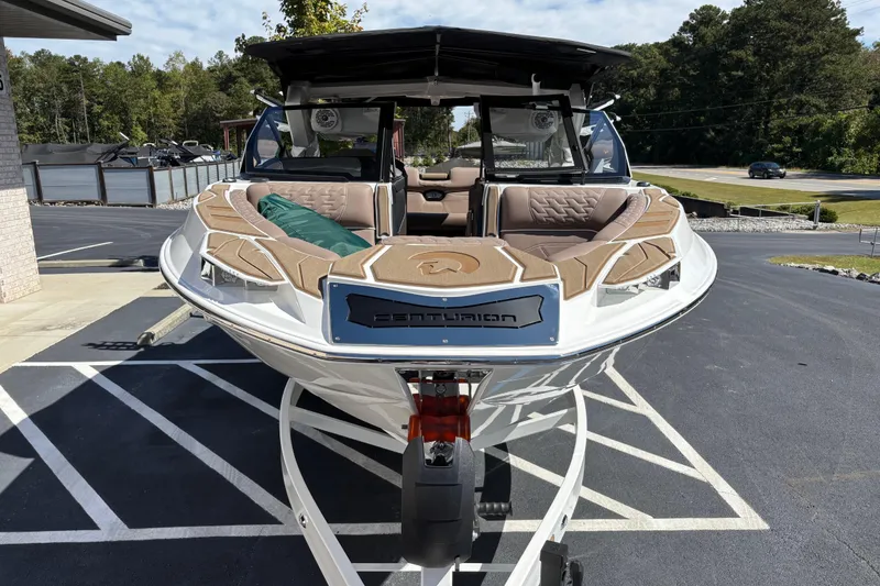 Slide: The Image of 2026 Centurion Ri230 boat displayed outdoors on a sunny day. - 3