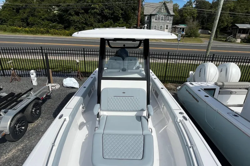 Slide: The Image of 2026 Sportsman Masters 247OE Bay Boat with sleek design and spacious seating. - 3