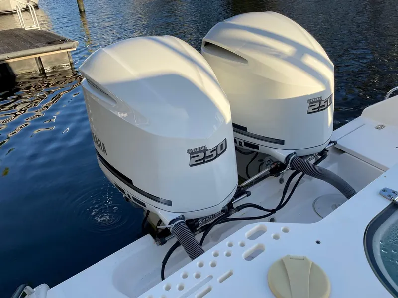 Slide: The Image of Twin Yamaha 250 outboard engines on a 2015 Pursuit S 280 Sport boat. - 23