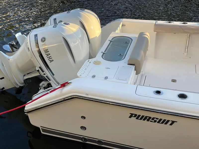 Slide: The Image of 2015 Pursuit S 280 Sport boat with Yamaha engines on water. - 24