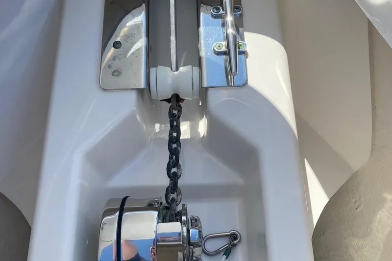 Slide: The Image of Anchor chain mechanism on a 2015 Pursuit S 280 Sport boat. - 27