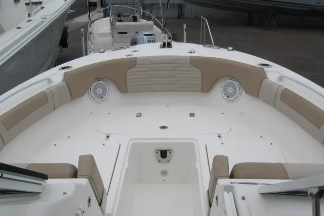 Slide: The Image of 2024 Edgewater 248CX Crossover boat interior with spacious seating and modern design. - 7