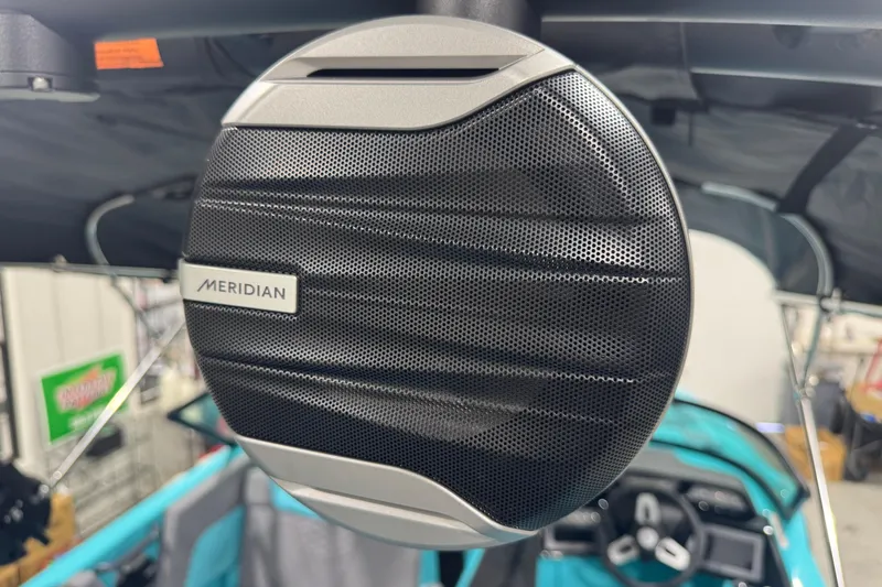 Slide: The Image of Close-up of Meridian speaker on 2026 MasterCraft NXT22 boat interior. - 19