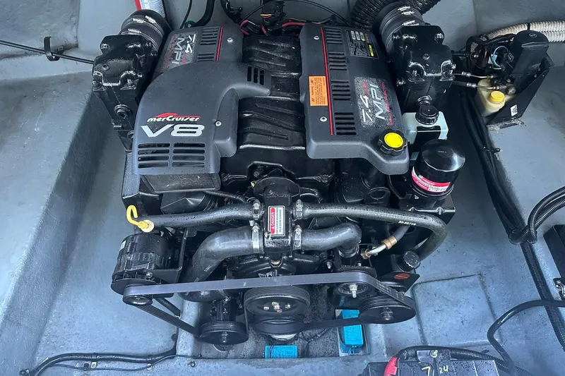 Slide: The Image of Engine of a 1998 Sea Ray 280 Cuddy Cabin boat, featuring a MerCruiser V8. - 18