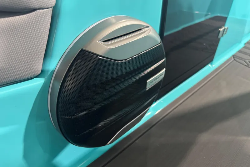 Slide: The Image of 2026 MasterCraft NXT22 boat speaker detail, turquoise interior, premium sound system. - 4