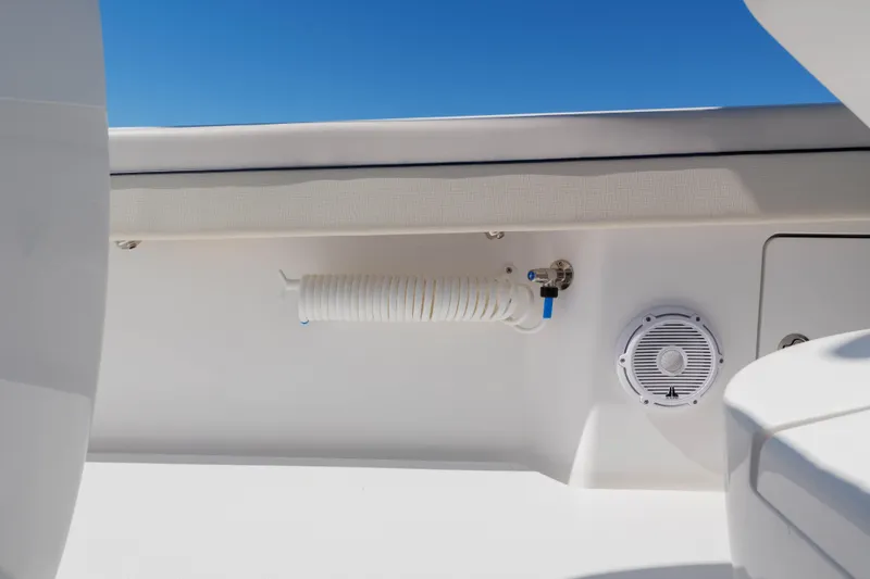 Slide: The Image of 2024 Valhalla Boatworks V-33 interior detail with coiled hose and speaker. - 31