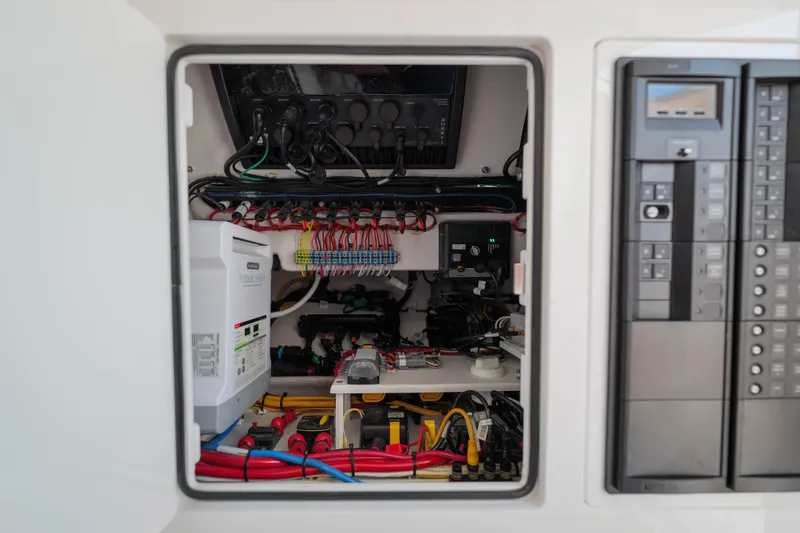 Slide: The Image of Electrical panel of 2024 Valhalla Boatworks V-33, showcasing wiring and components. - 37