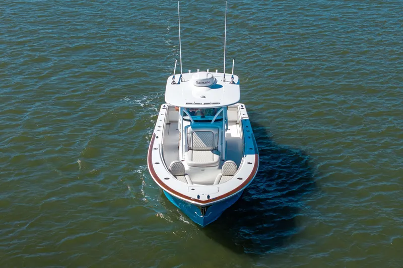 Slide: The Image of 2024 Valhalla Boatworks V-33 on water, aerial view, sleek design. - 42