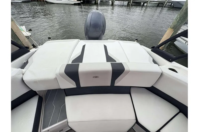 Slide: The Image of 2018 Regal 21 OBX boat interior with stylish seating and water view. - 12