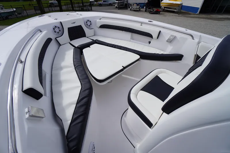 Slide: The Image of 2026 Tidewater 232 LXF boat interior with sleek seating and modern design. - 16