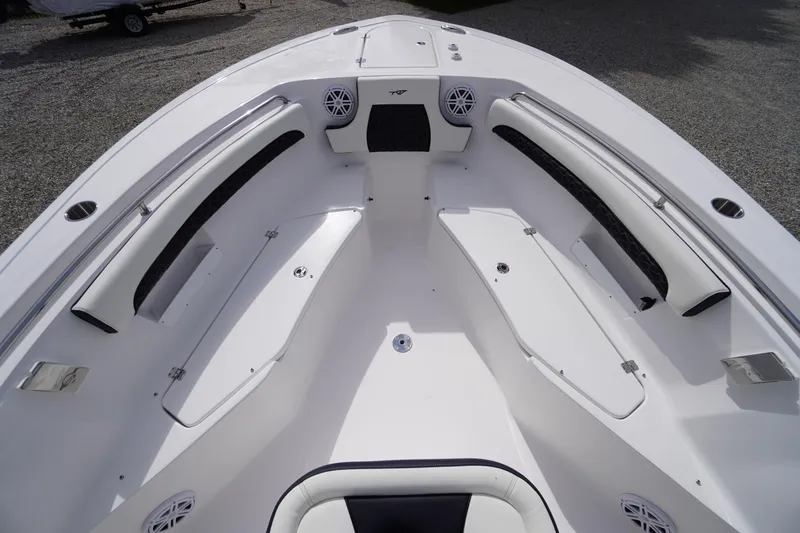Slide: The Image of 2026 Tidewater 232 LXF boat interior with seating and storage compartments. - 17