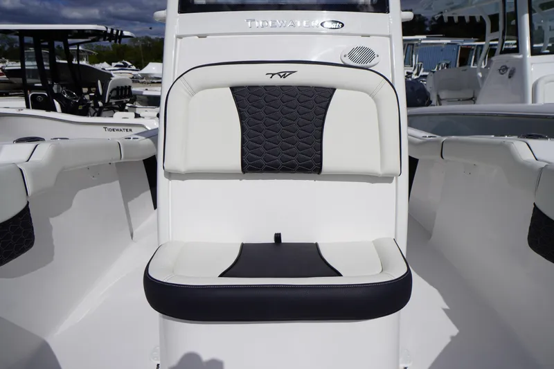 Slide: The Image of 2026 Tidewater 232 LXF boat interior with stylish seating and modern design. - 25