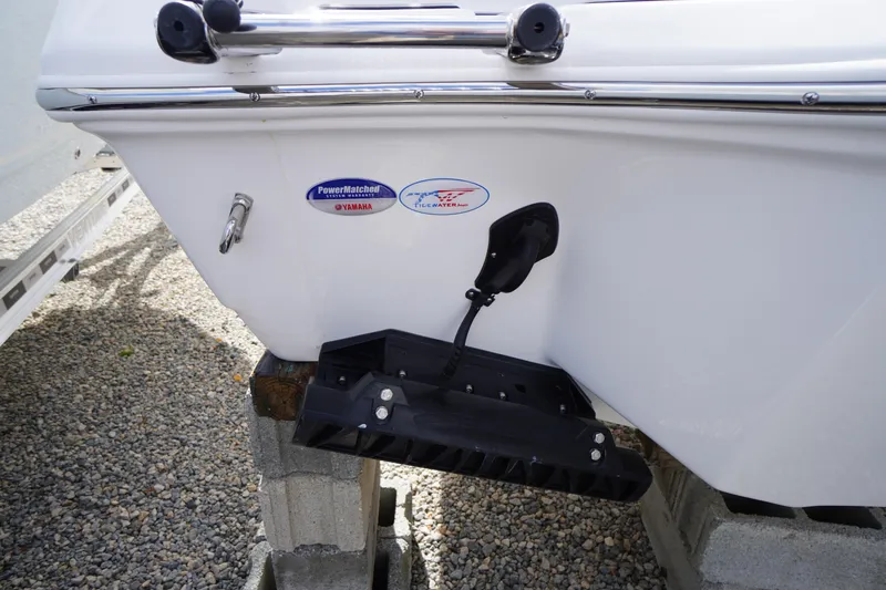 Slide: The Image of 2026 Tidewater 232 LXF boat stern with Yamaha PowerMatched system on cinder blocks. - 56