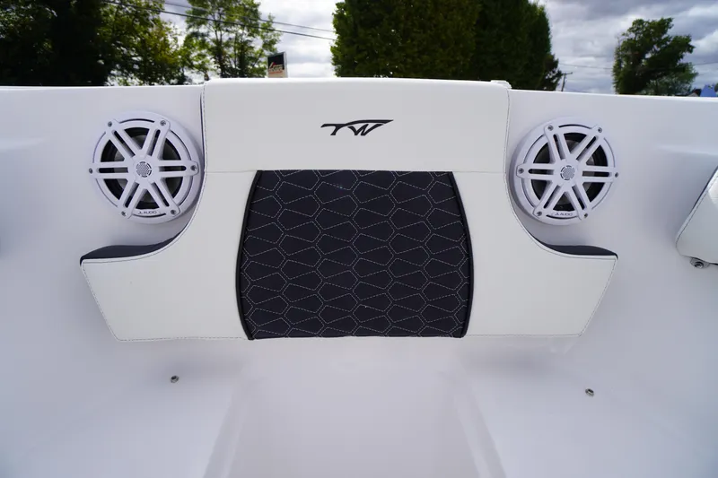 Slide: The Image of 2026 Tidewater 232 LXF boat interior with speakers and stylish seating. - 9