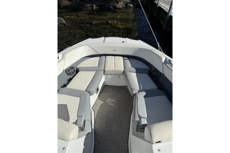 Slide: The Image of 2017 Cobalt 24SD boat interior with spacious seating and elegant design. - 18