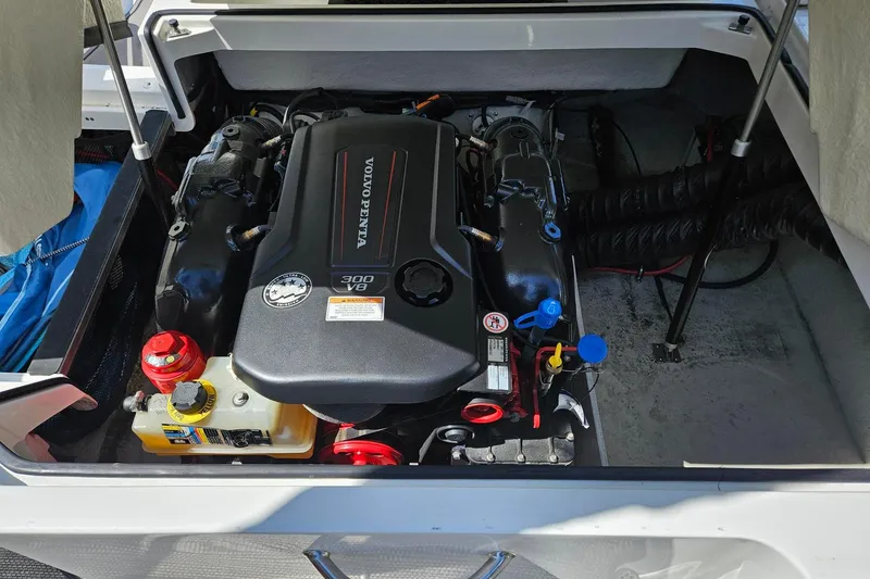 Slide: The Image of 2017 Cobalt 24SD boat engine compartment with Volvo Penta 300 V8 engine. - 23