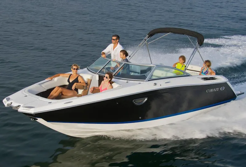 Slide: The Image of Manufacturer Provided Image: 2017 Cobalt 24SD boat cruising with passengers on a sunny day. - 8