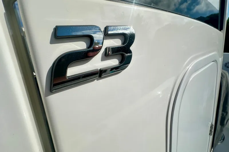 Slide: The Image of Chrome "23" emblem on 2025 Regulator boat exterior. - 9