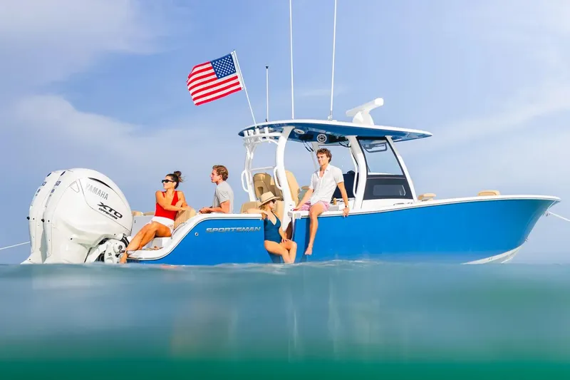 The Image of 2026 Sportsman Heritage 321 Center Console boat with Yamaha engine in showroom. - 0