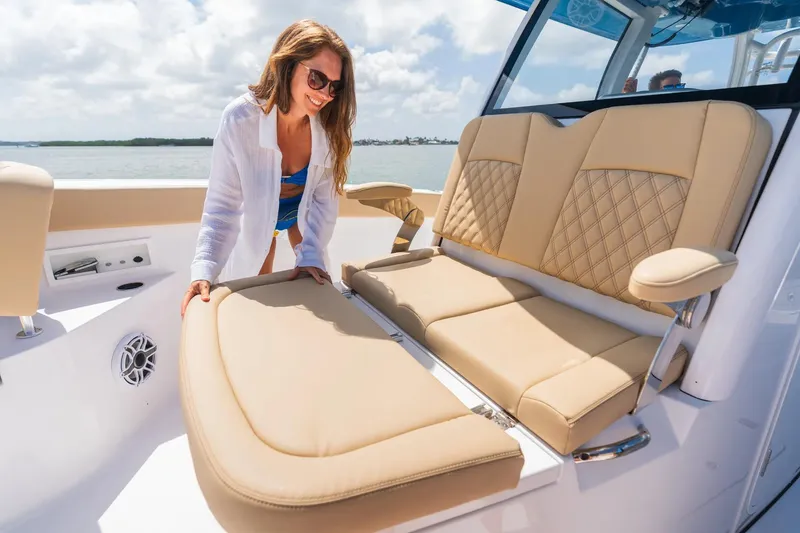 Slide: The Image of 2026 Sportsman Heritage 321 Center Console interior with dual seats and steering wheel. - 6