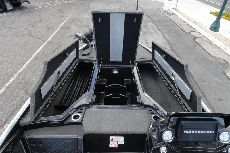 Slide: The Image of Open storage compartments on a 2021 Nitro Z19 Pro boat, featuring a Humminbird system. - 12