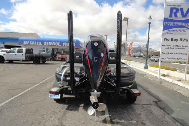 Slide: The Image of 2021 Nitro Z19 Pro boat at RV sales lot, rear view with motor and propeller. - 20