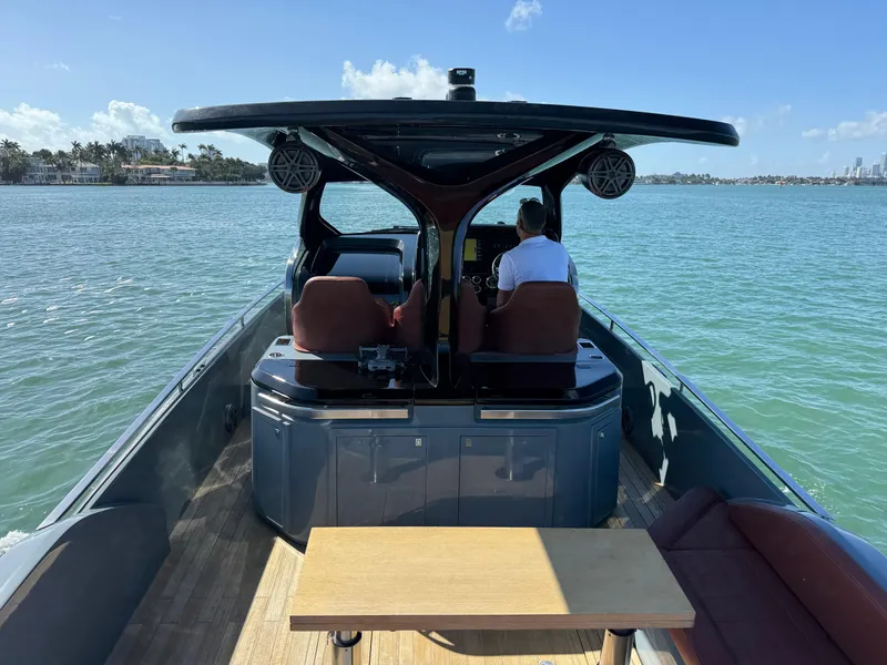 Slide: The Image of 2019 SACS Rebel 40 yacht cruising on calm waters under a clear blue sky. - 22
