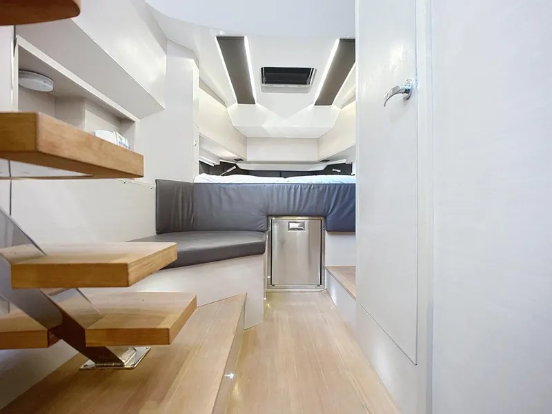 Slide: The Image of Modern interior of 2019 SACS Rebel 40 yacht with wooden stairs and sleek design. - 24