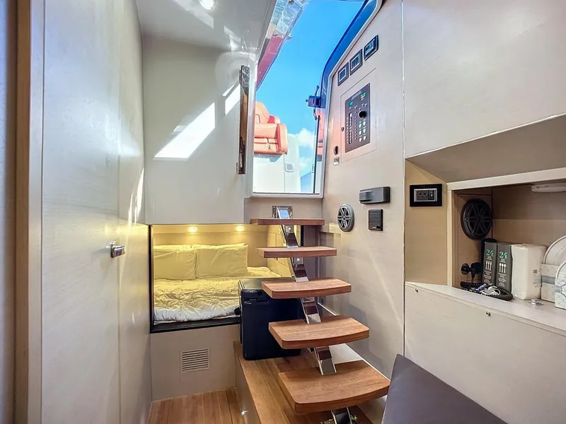 Slide: The Image of Interior of 2019 SACS Rebel 40 yacht with wooden steps and cozy cabin. - 27