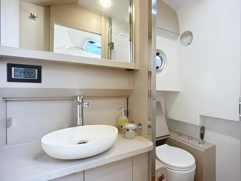 Slide: The Image of Modern bathroom interior of 2019 SACS Rebel 40 yacht, featuring sleek design and amenities. - 31