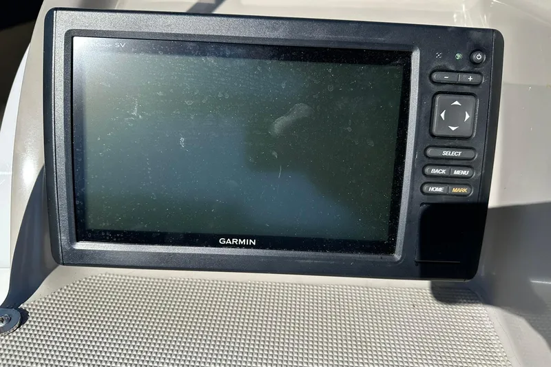 Slide: The Image of Garmin marine GPS device on 2003 Formula 260 Sun Sport boat dashboard. - 10